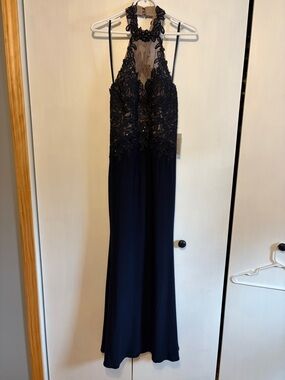 XSCAPE navy halter open cross back full length lace appliqué beaded evening gown